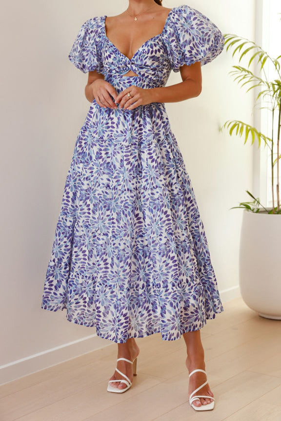 Vestido midi con mangas abullonadas y estampado floral en azul y blanco