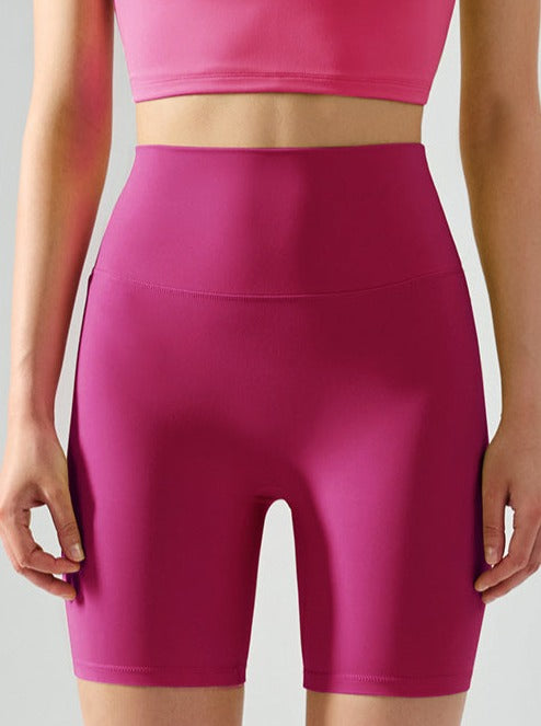 Pantalones cortos de yoga de cintura alta elásticos sin costuras de color sólido 