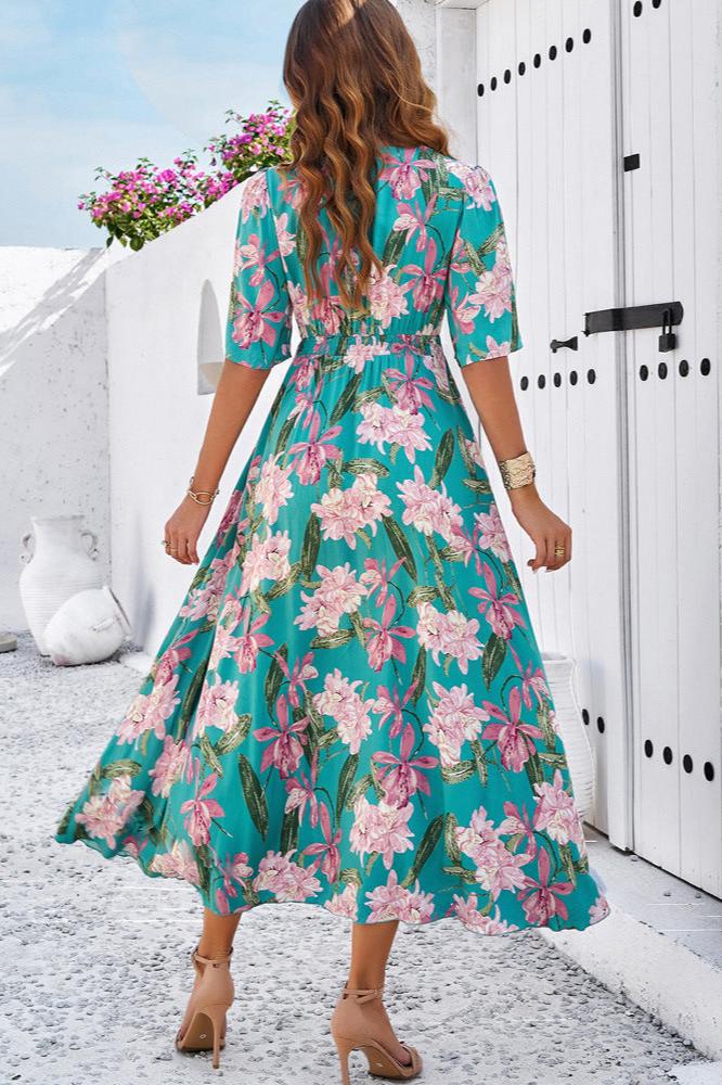 Vestido midi elegante de verano con escote en V y abertura lateral con flores