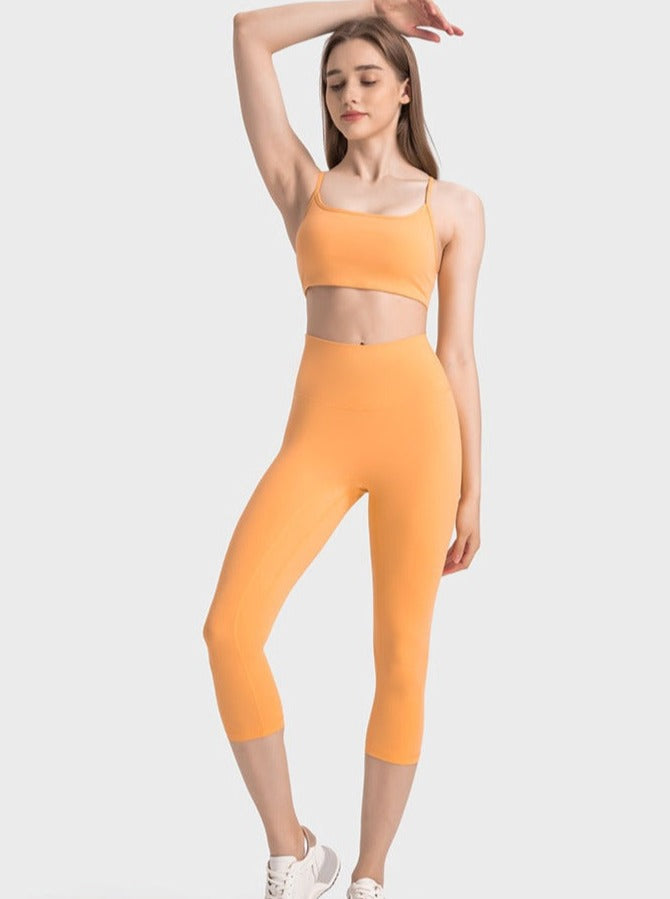 Pantalones de yoga elásticos de cintura alta para ejercicio de color naranja