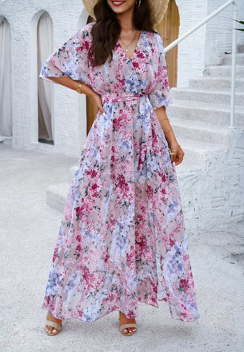 Vestido plisado con escote en V y estampado floral