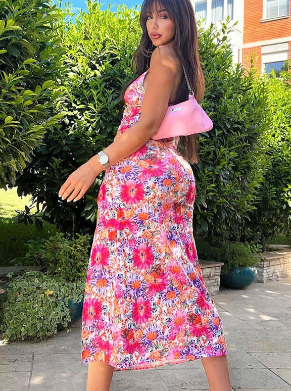 Vestido de verano sexy con abertura reveladora y estampado floral 