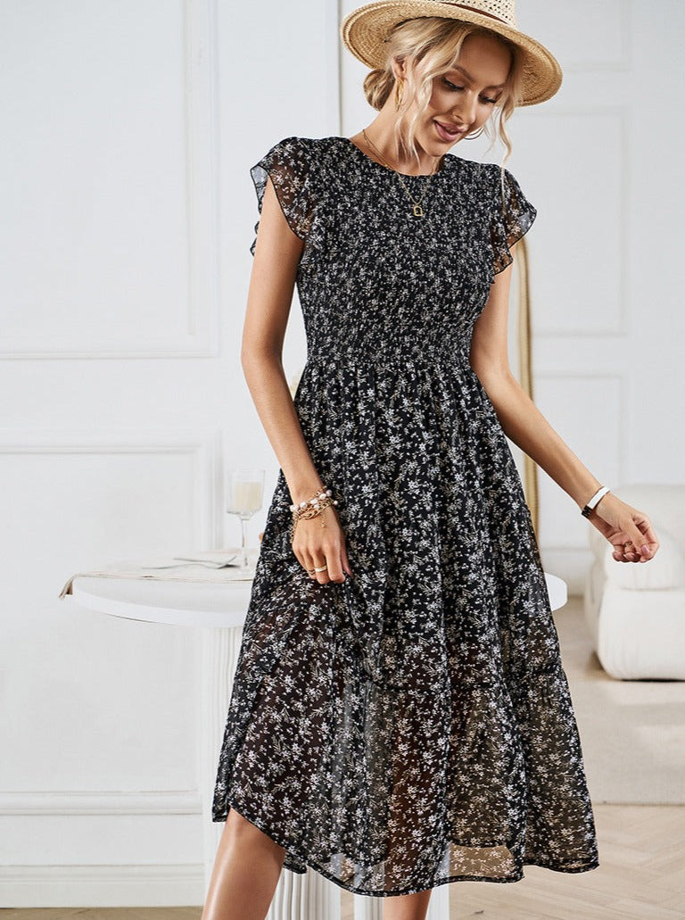 Vestido midi con volantes y cintura definida con diseño floral