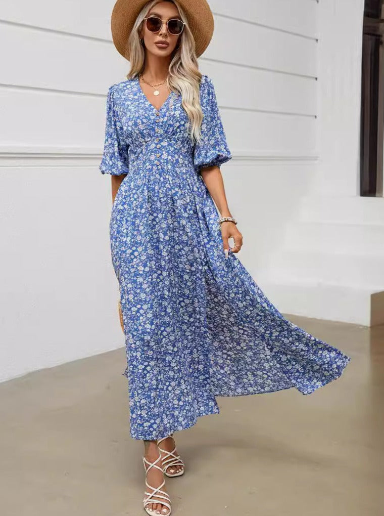 Vestido azul bohemio con escote en V y mangas abullonadas en la cintura