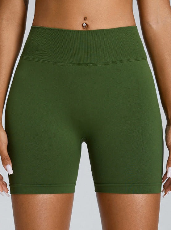 Pantalones cortos deportivos de cintura alta sin costuras que realzan los glúteos en color verde menta 