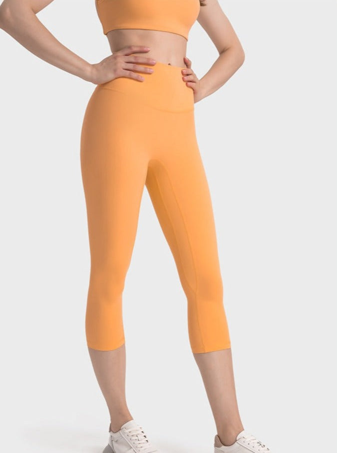 Pantalones de yoga elásticos de cintura alta para ejercicio de color naranja