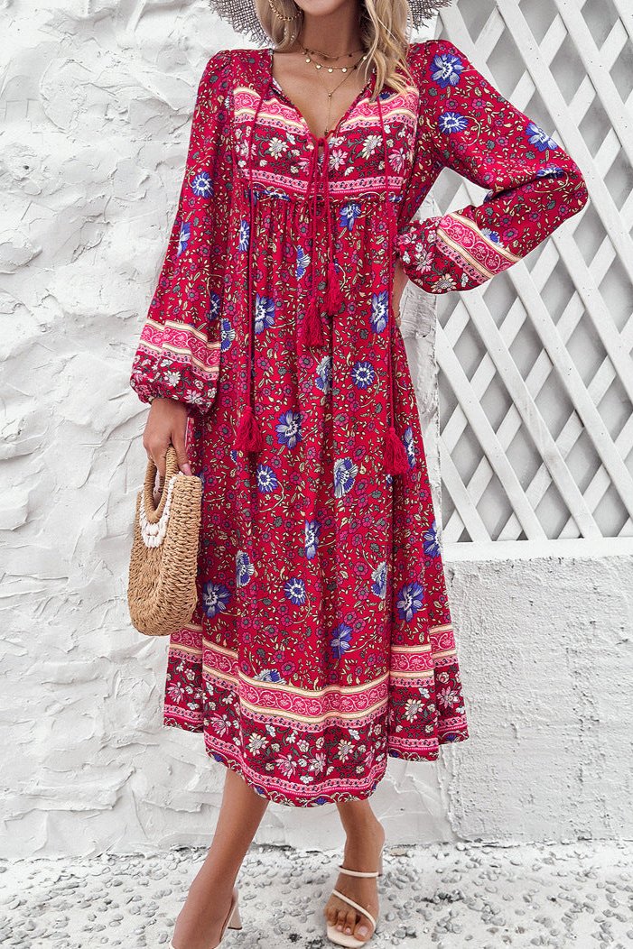 Elegante vestido midi con mangas largas y estampado floral rojo 