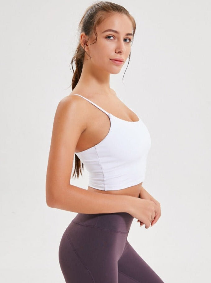 Top corto deportivo sin mangas para yoga de color morado claro