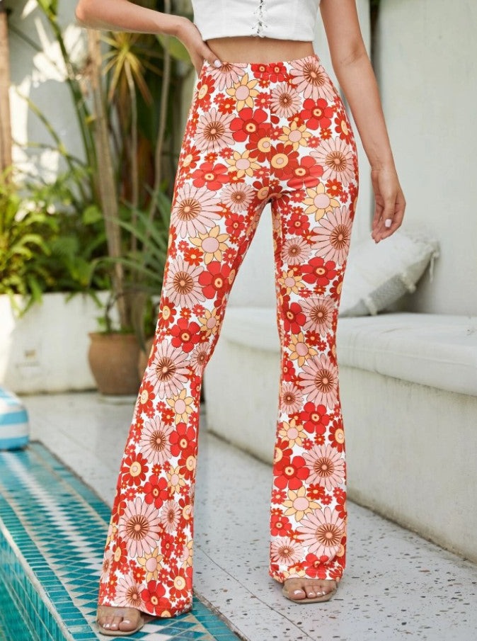 Pantalones ajustados con estampado floral y campana 