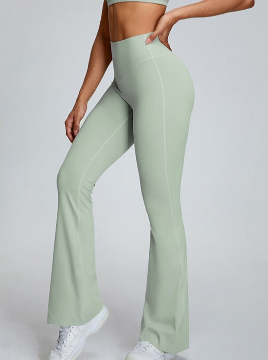 Pantalones de yoga micrograndes con cintura alta y control de abdomen de color verde 