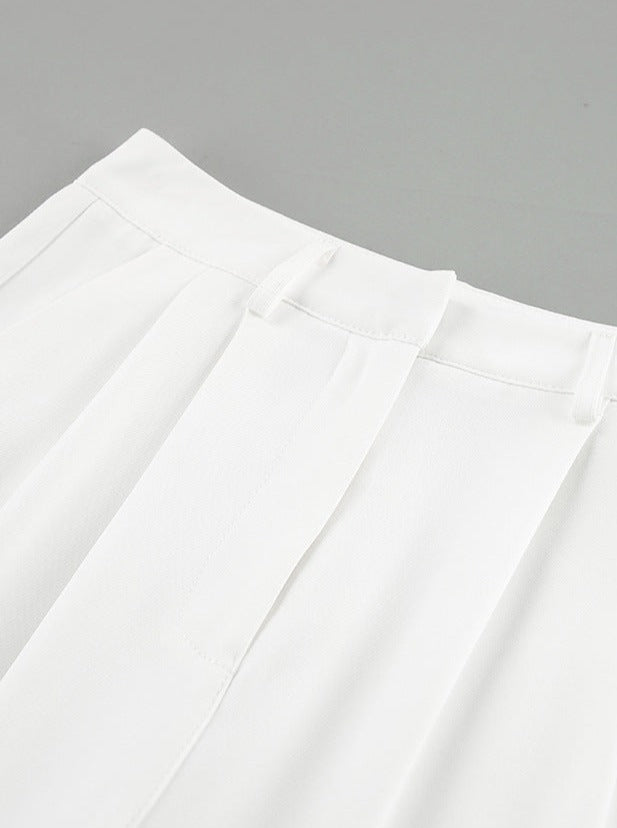 Pantalones blancos de cintura alta y pierna ancha 