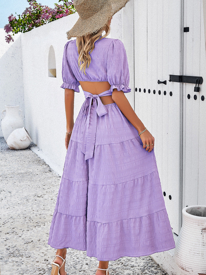 Vestido morado con escote en V y cintura anudada 